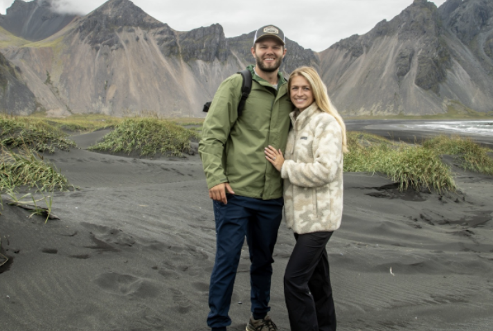 Connor and his wife in the mountains