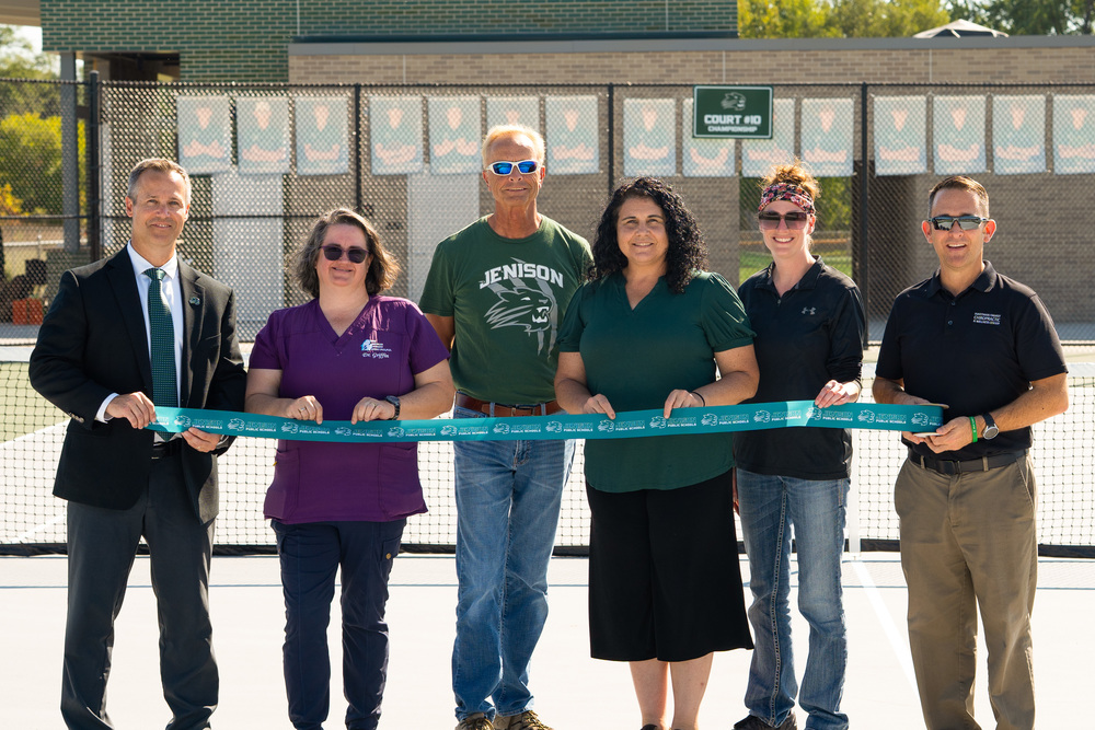 Board cutting ribbon