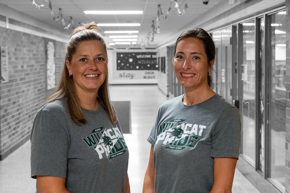 Staff posing in hallway