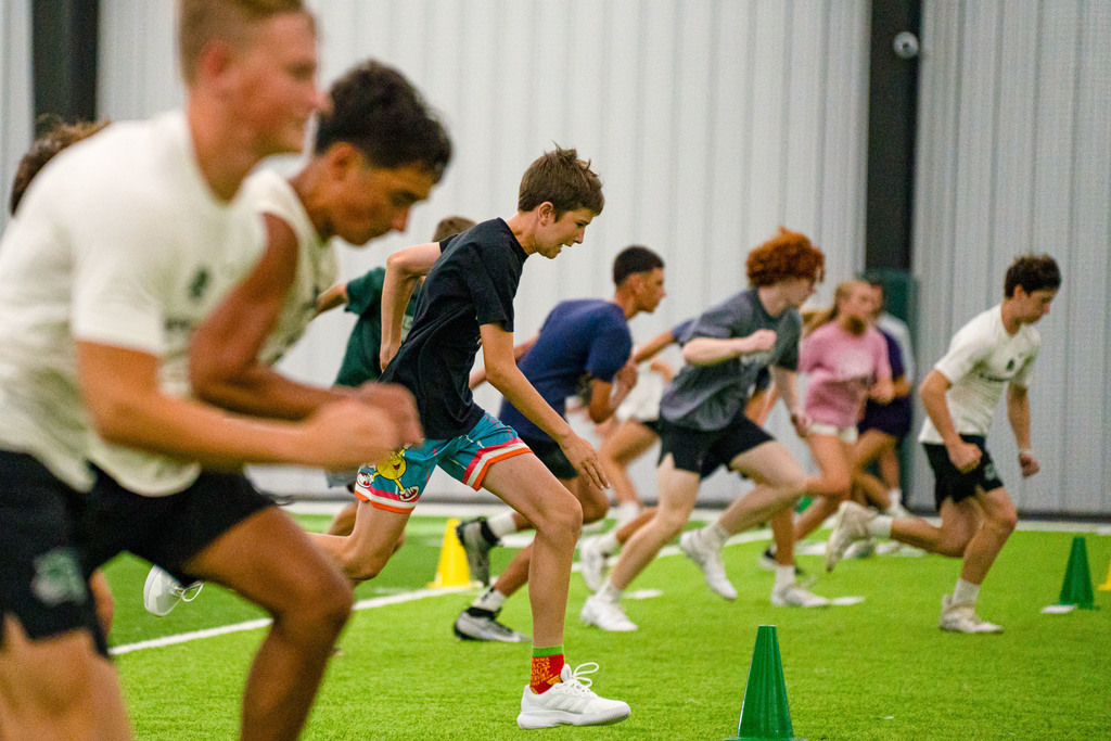 Students running on the field