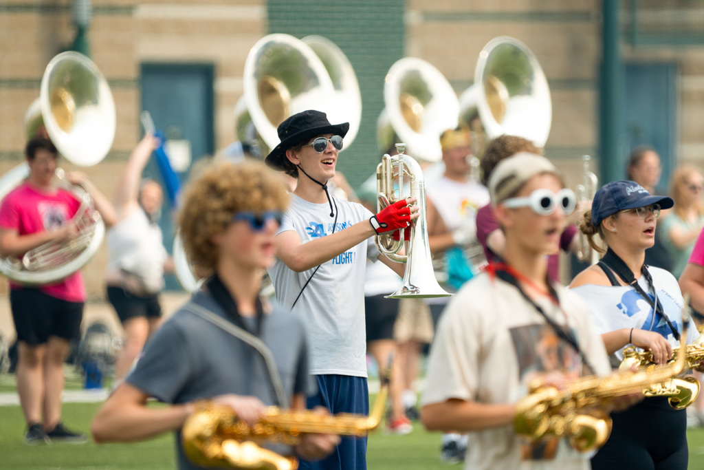 Marching band member plays