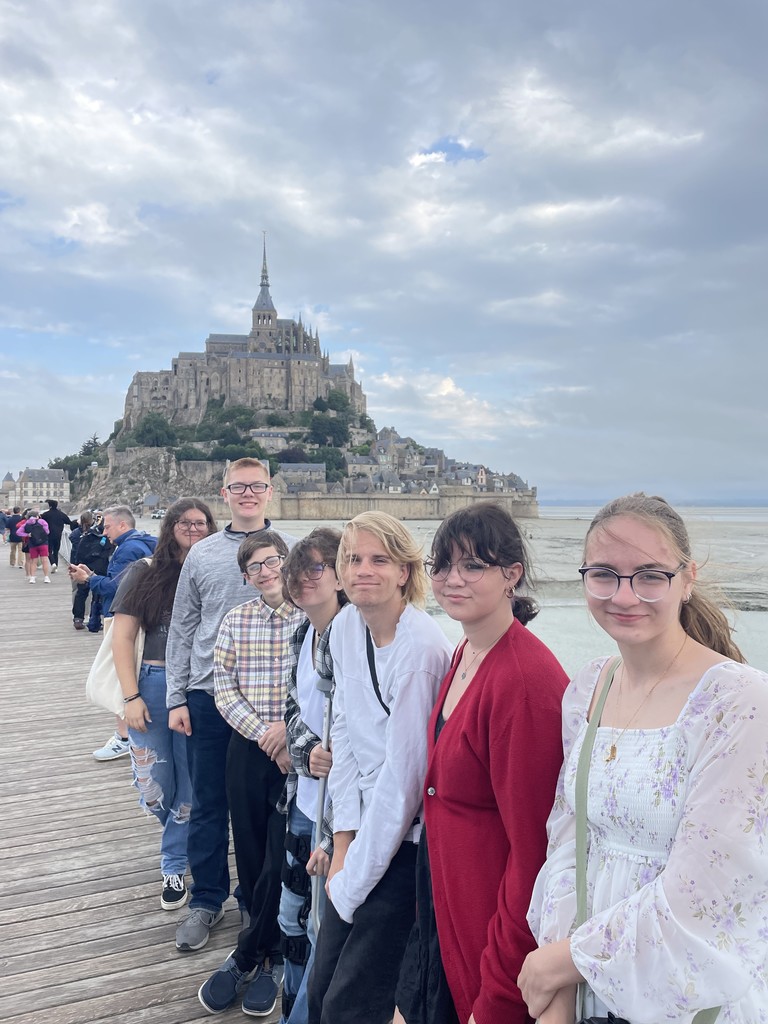 Students near old building in France