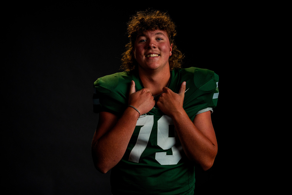 Football player posing