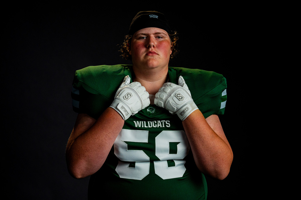 Football player posing