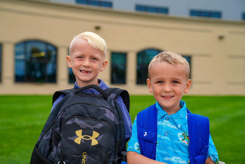 Students posing outside school