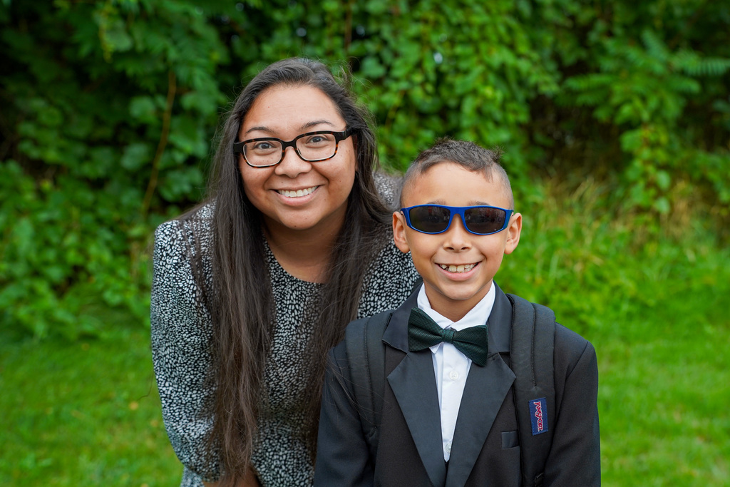 Student and parent outside school
