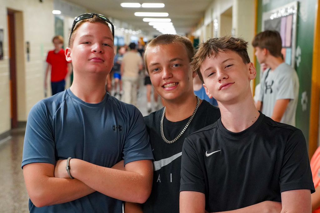 Students posing in hallway