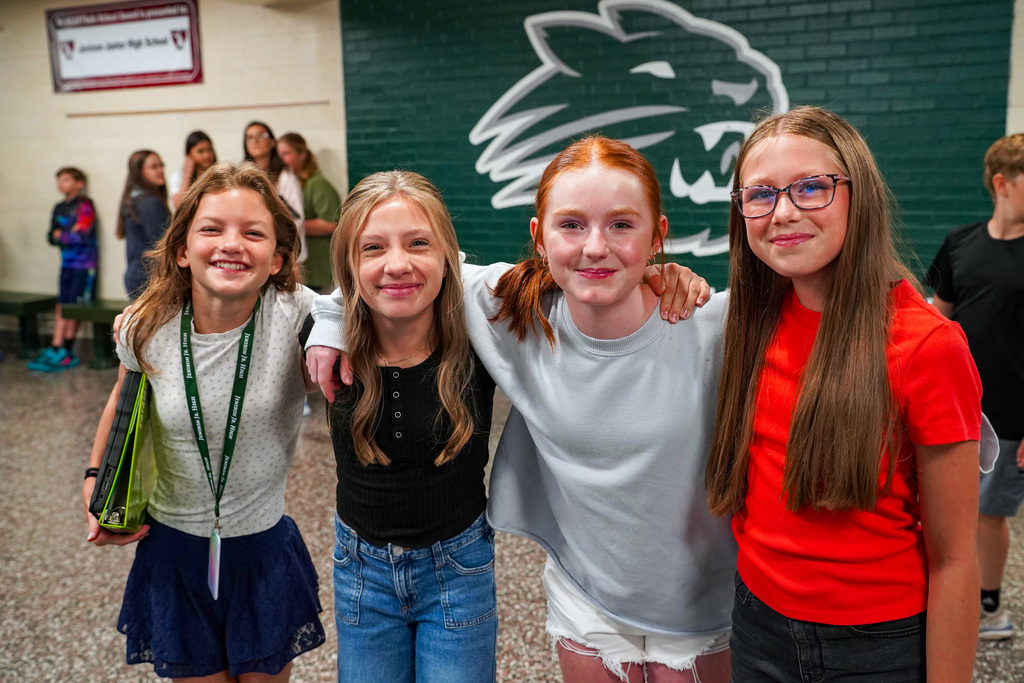 Students posing in hallway