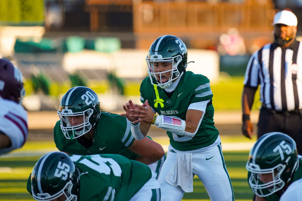 Quarterback hiking football