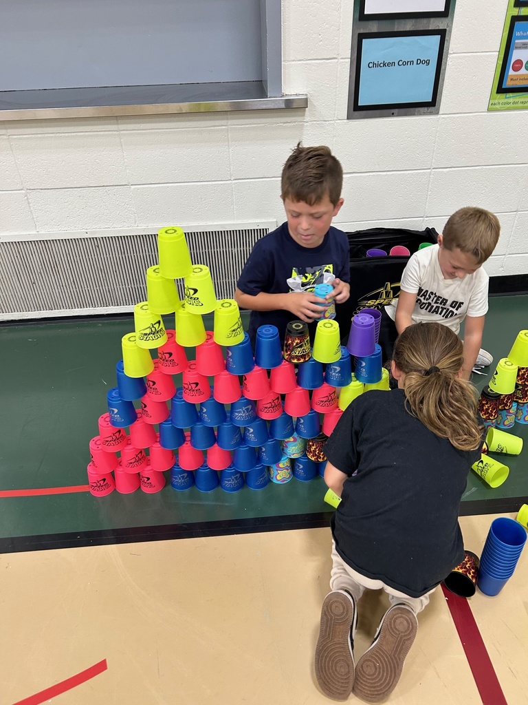 1st Graders doing Stacking Cups in PE