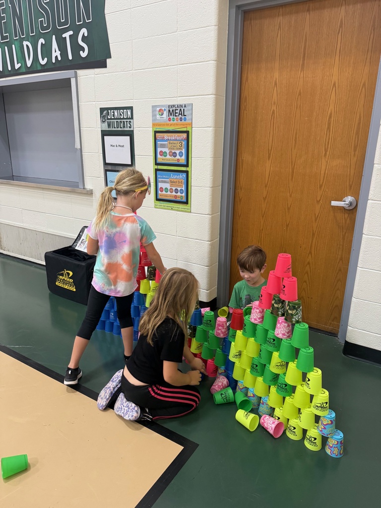 1st Graders doing Stacking Cups in PE