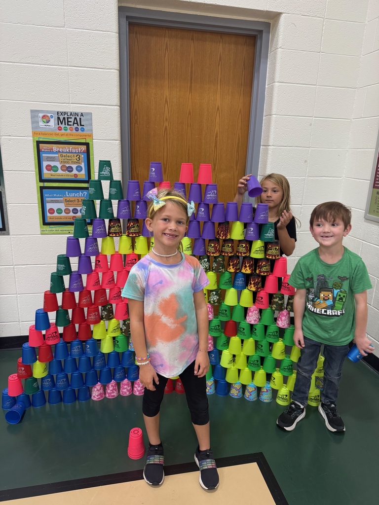 1st Graders doing Stacking Cups in PE