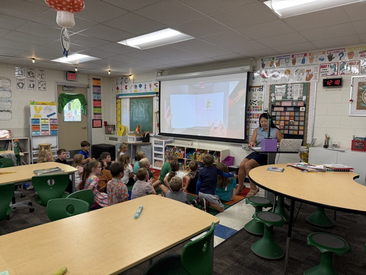 Teacher Reading to Class