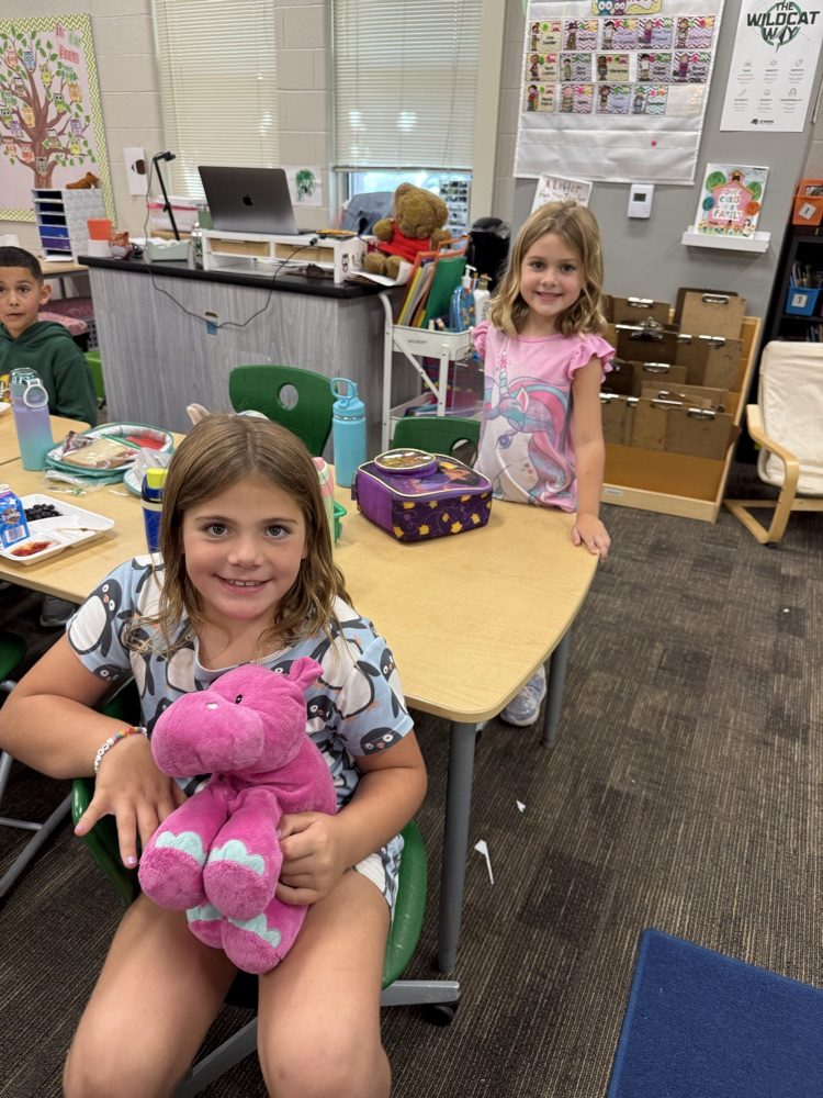 Students with stuffed animal