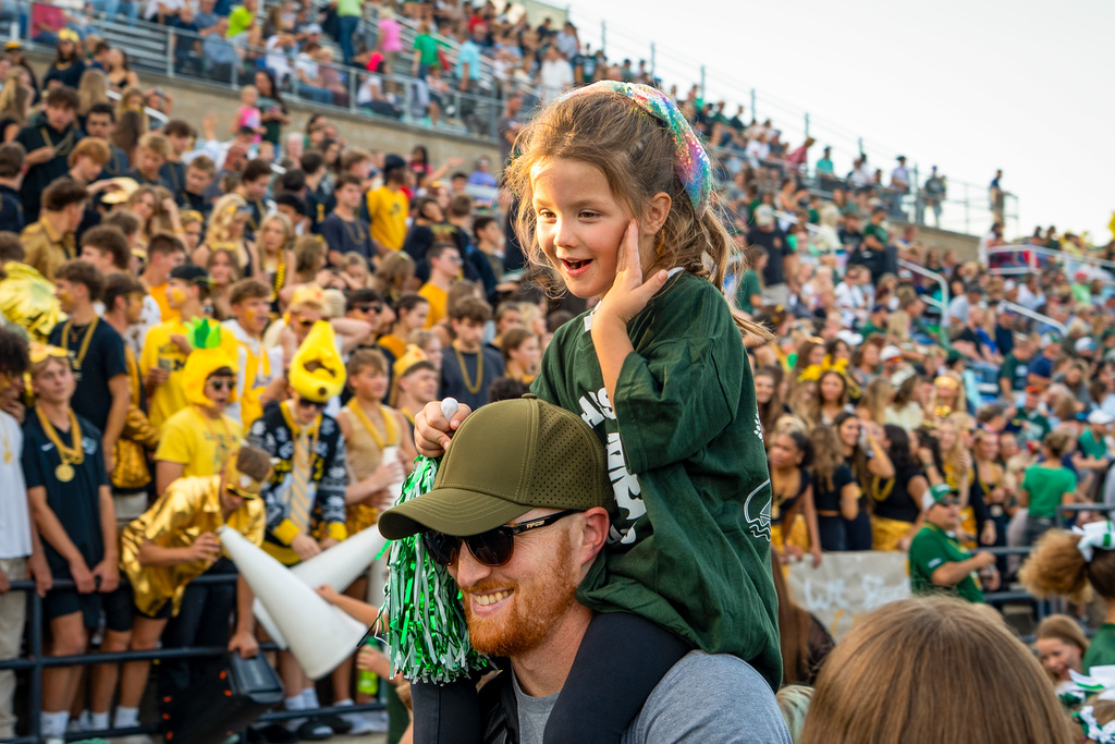 Kindergarten student smiling at Kid Cats Game