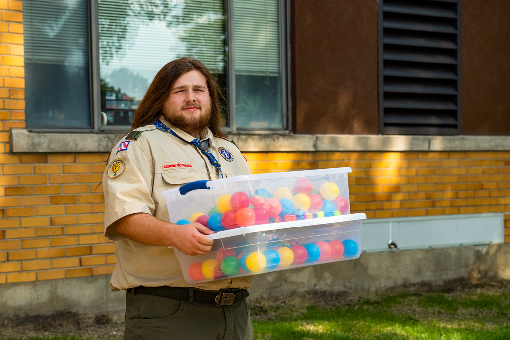 Bursley student posing outside school