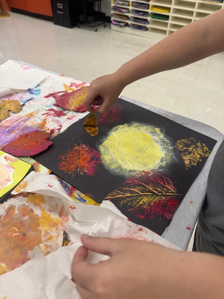 Student doing art work