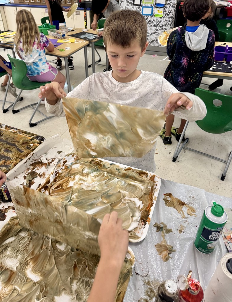 Student creating artwork