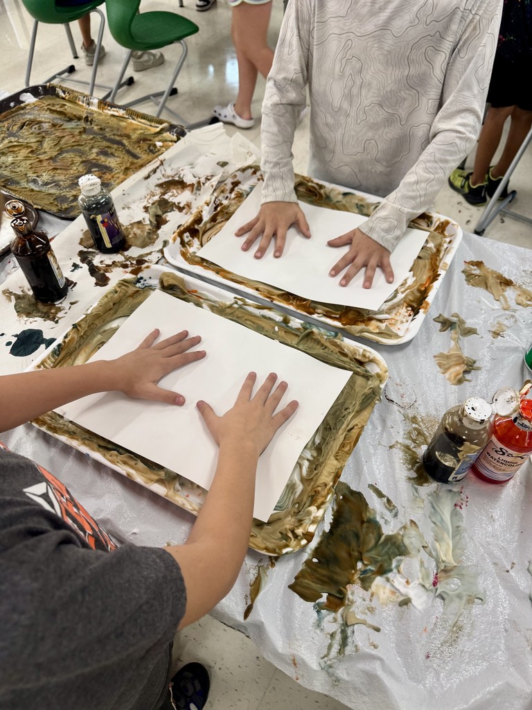 Students creating artwork