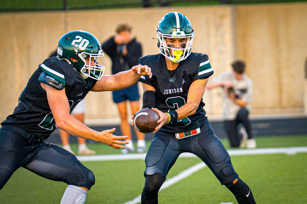 Quarterback handing off