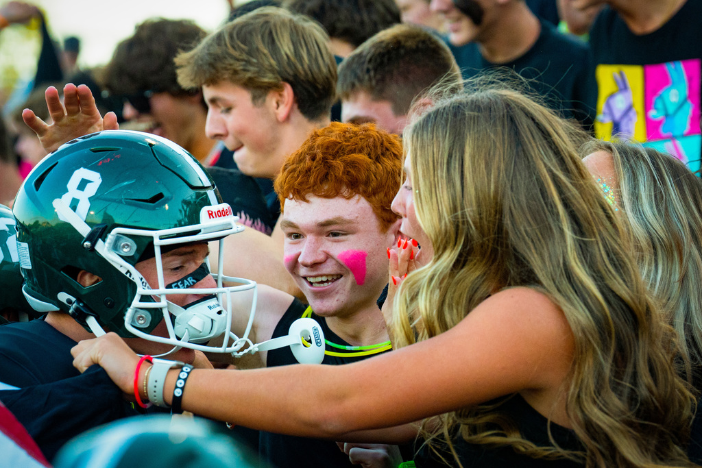 Fans at football game