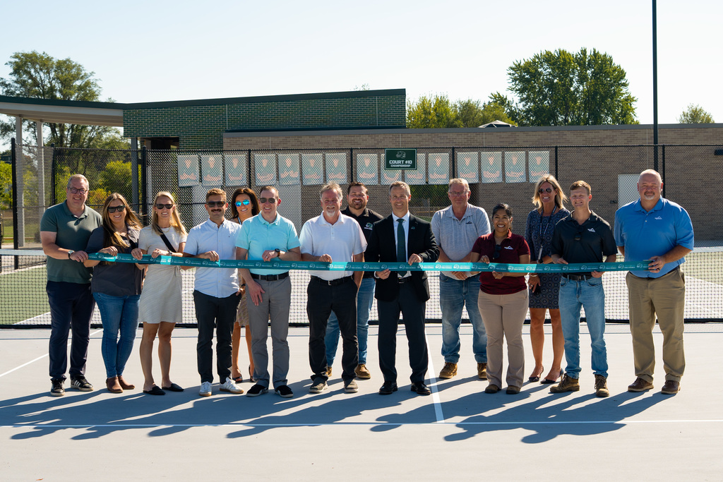 Contractors cutting ribbon