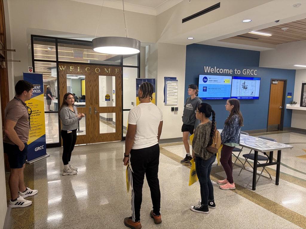 JIA Students and Staff in the hallway at GRCC for a campus tour