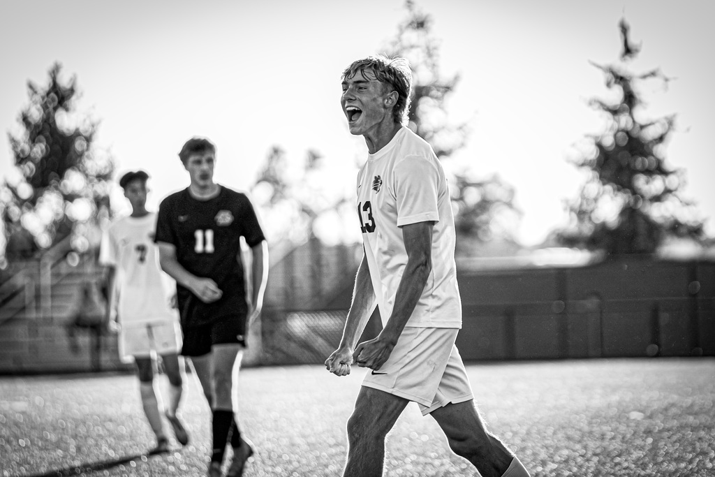 Boys soccer player excited