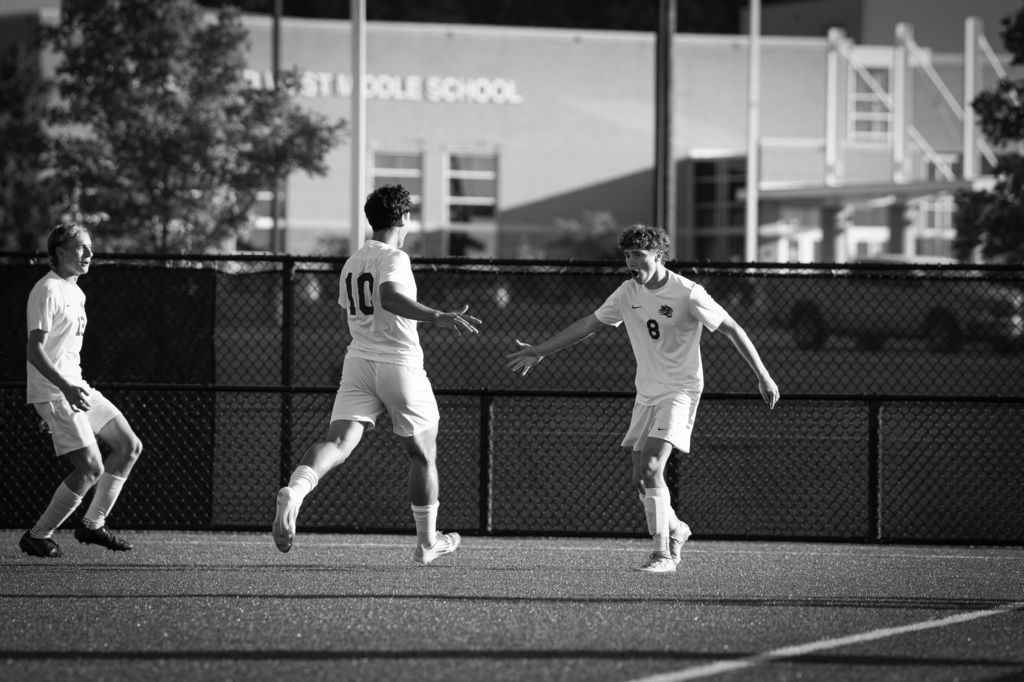 Boys soccer player celebrating