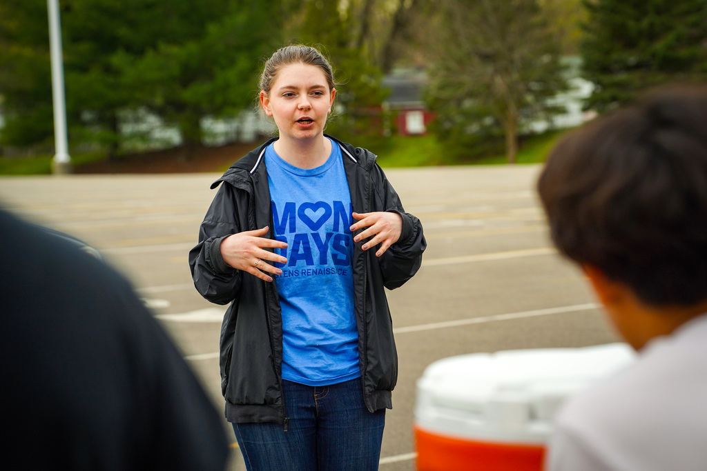 Student speaking at outdoor event
