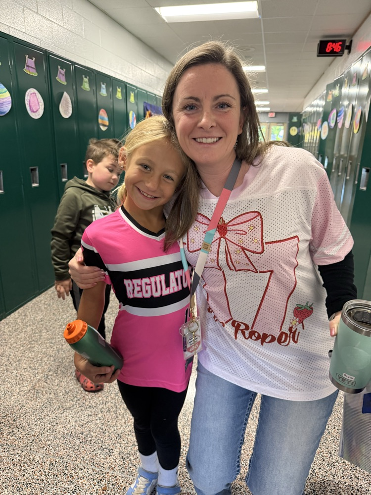 teacher and student wearing jersey