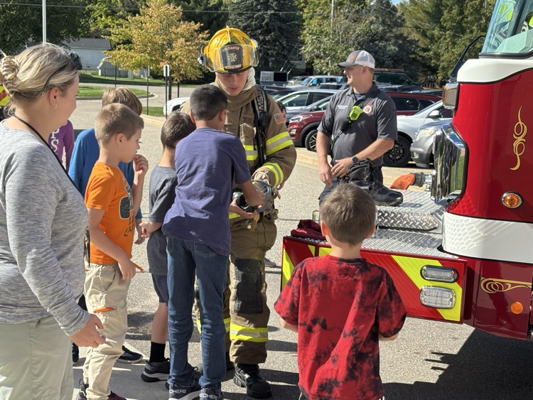 fireman with student