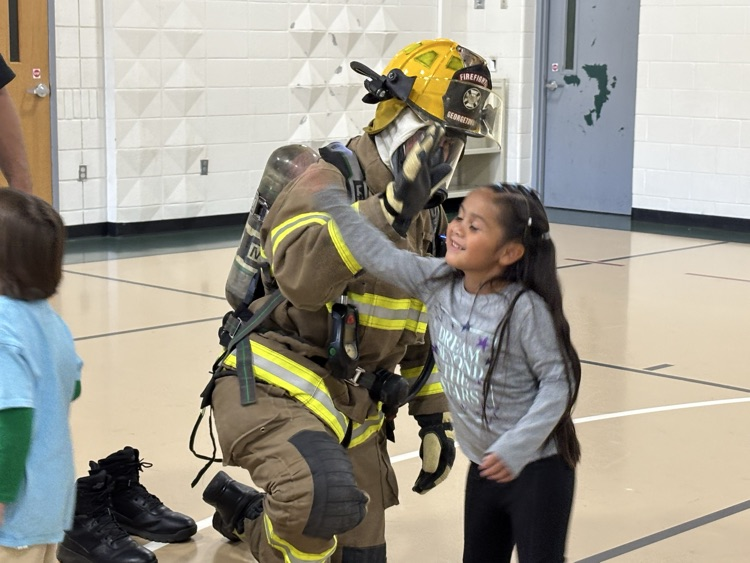 fireman with student