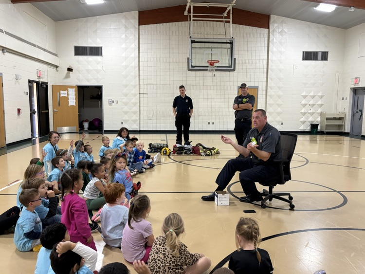 fireman demonstrating fire alarm