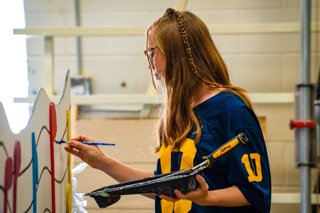 Student working on homecoming float