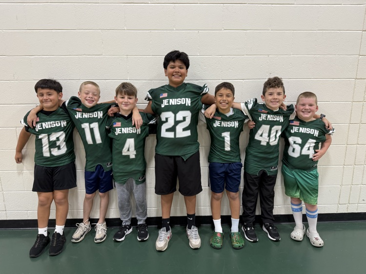 4th grade boys in football jersey