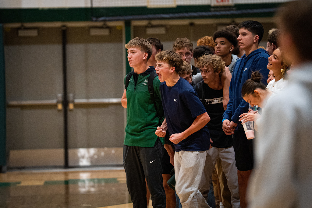 Students cheering at assembly