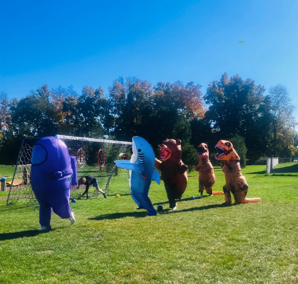 Teachers racing in Blow up costumes