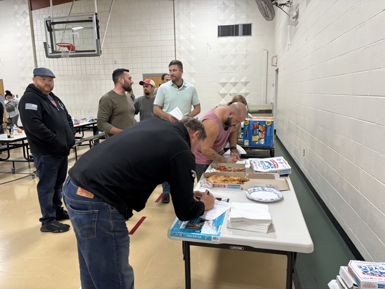 Volunteers signing up