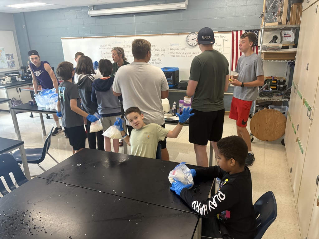 Students in a classroom making ice cream