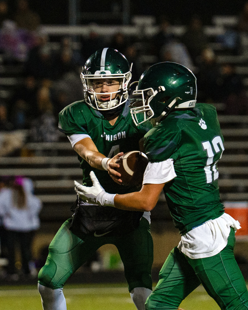 JV football players playing