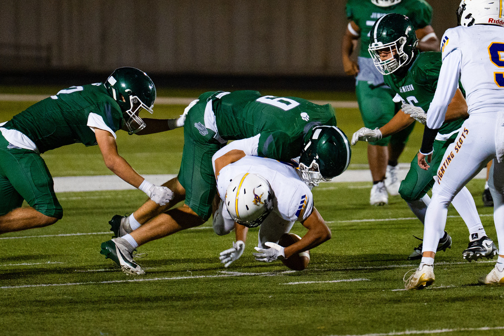 JV football players playing