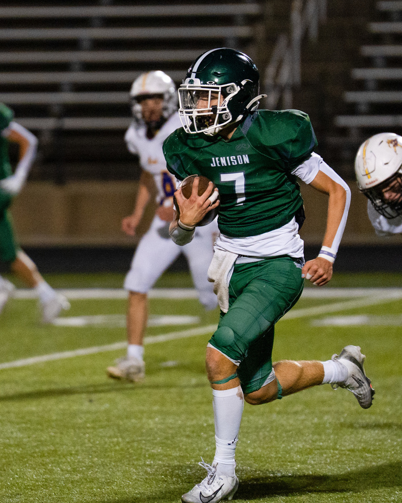 JV football players playing