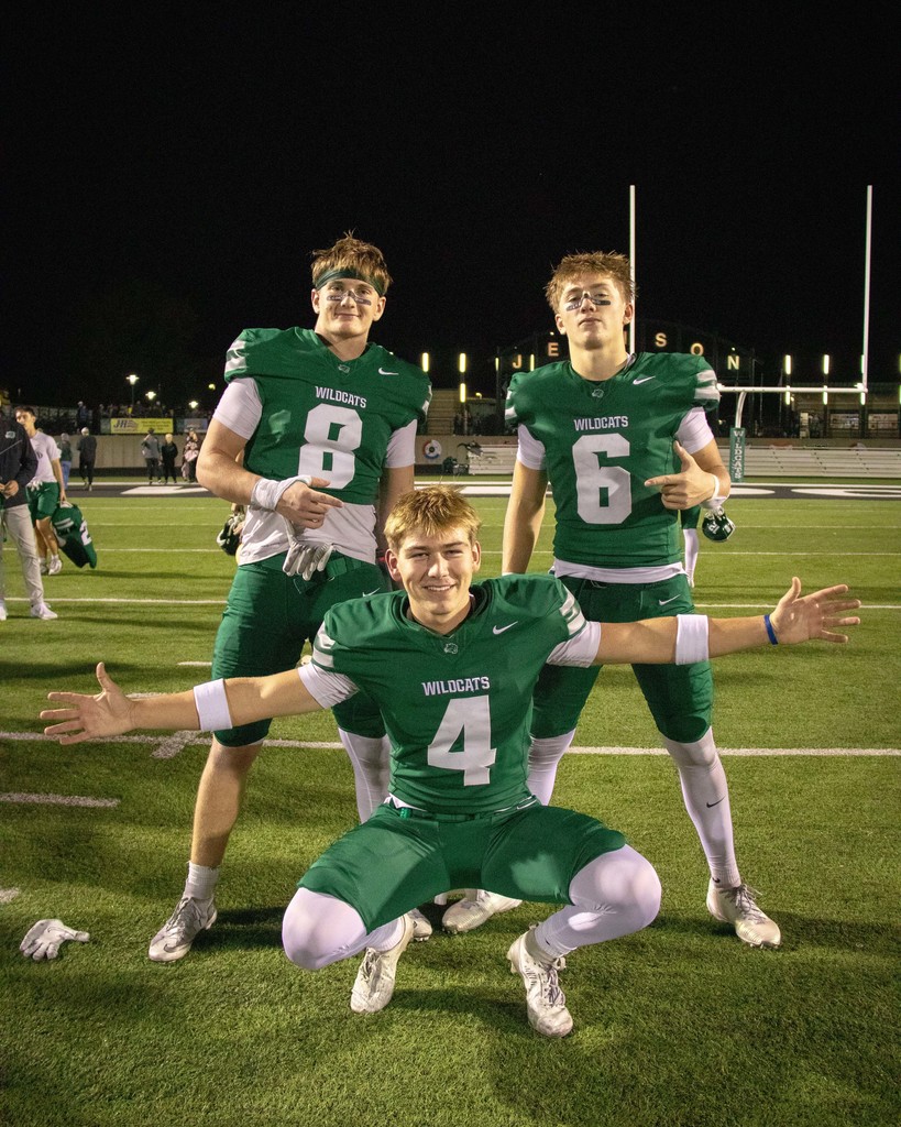 Football players celebrating win
