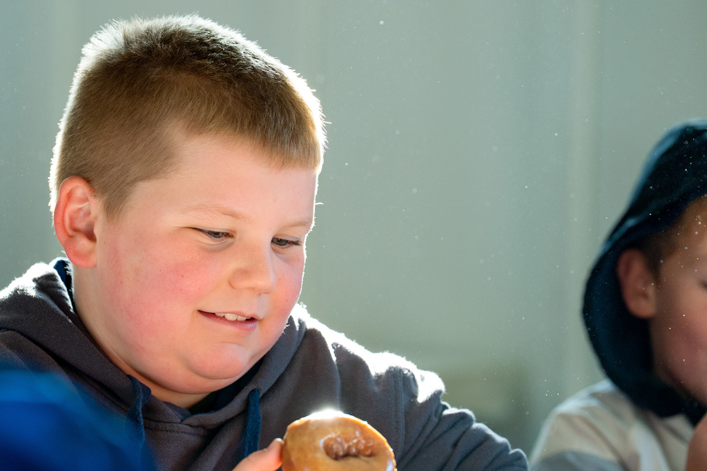 Students smiling at Post Family Farm