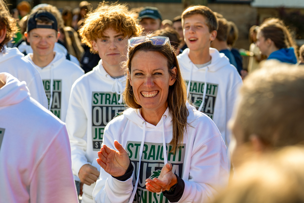 Cross country coach cheering