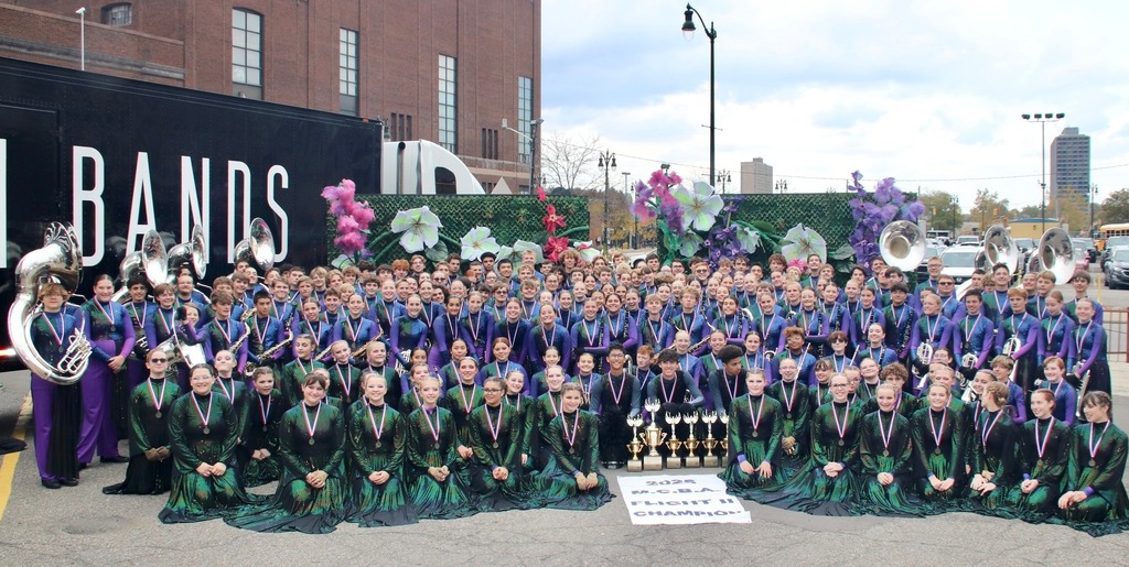 Band posing at Ford Field