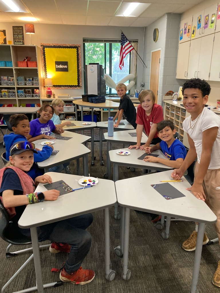 Students doing aboriginal dot art