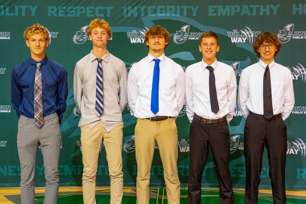 Boys cross country posing