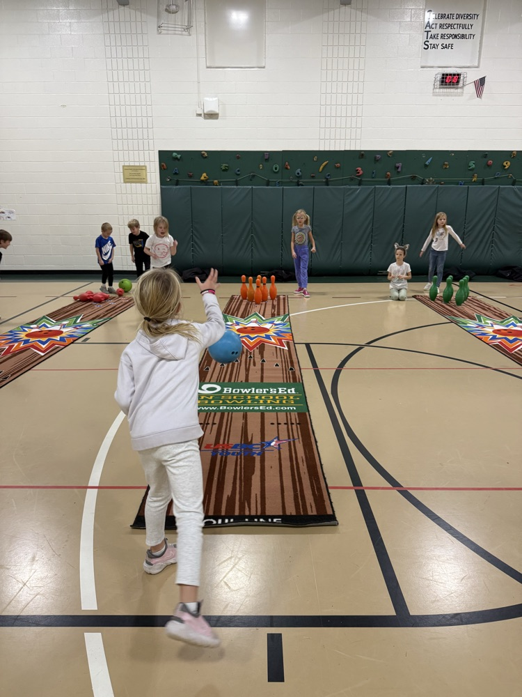 students bowling in PE